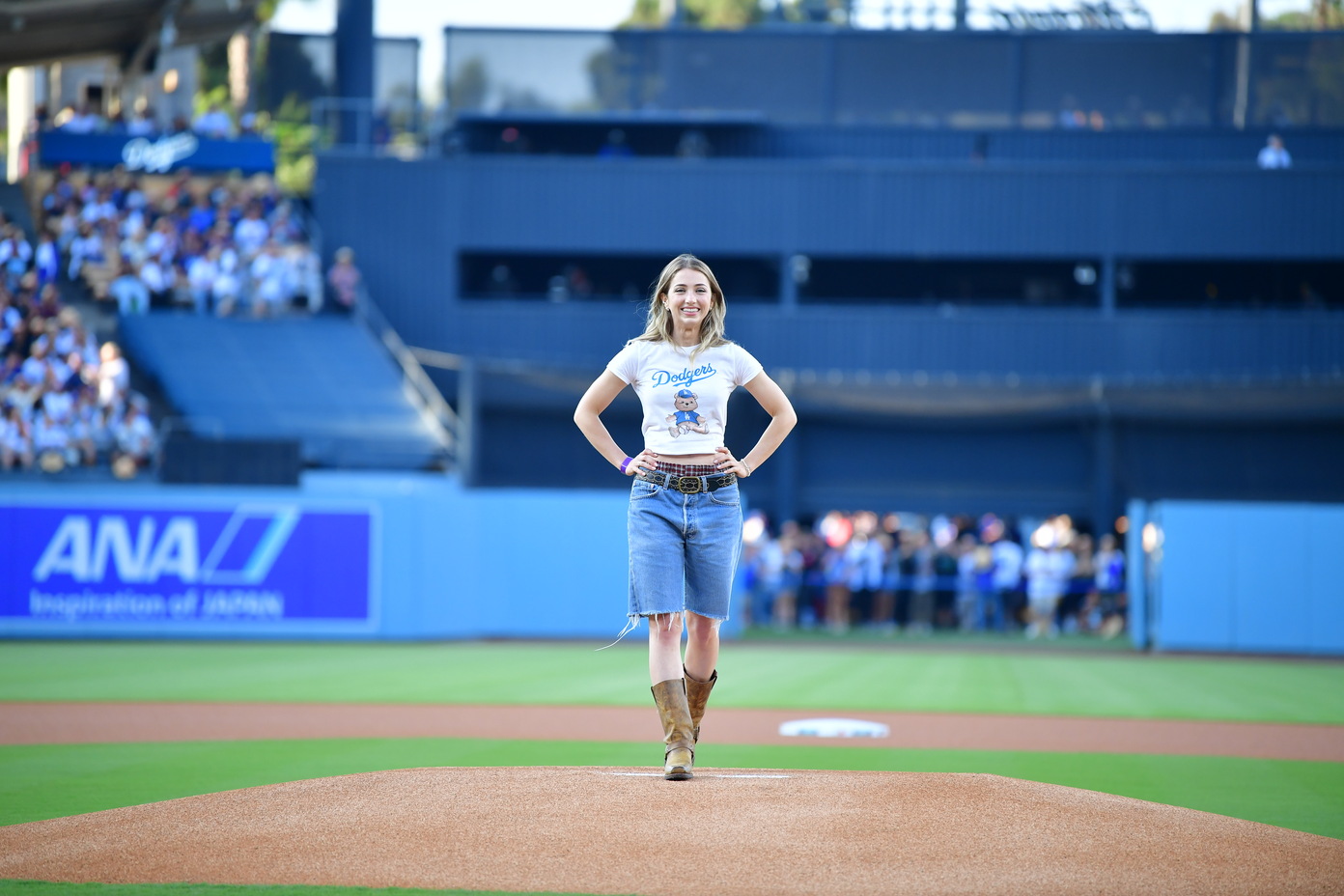 emily rudd throws one piece night first ceremonial pitch